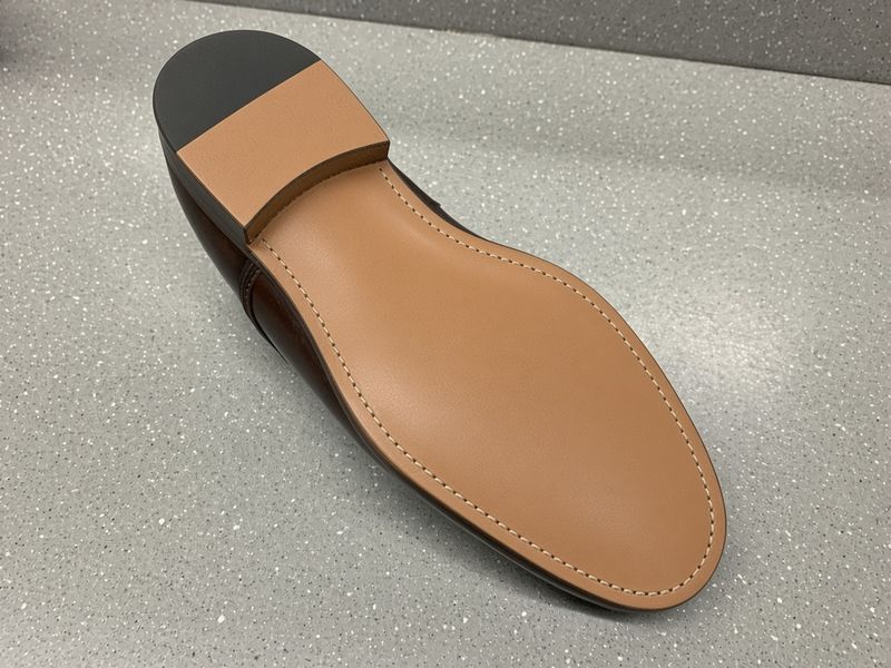 Dress shoe sole, after: new leather sole and new heel